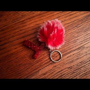 Red glitter T resin keychain with white and red fuzzy pom pom handmade